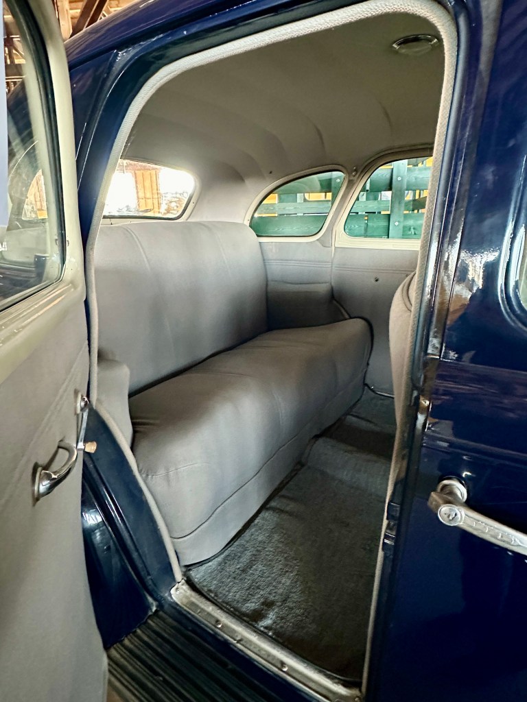 interior of the back seat of the staff car